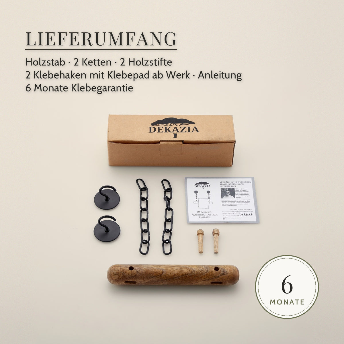 Lieferumfang: Holzstab, zwei Ketten, zwei Holzstifte, zwei Klebehaken mit Klebepad ab Werk, Anleitung und Karton