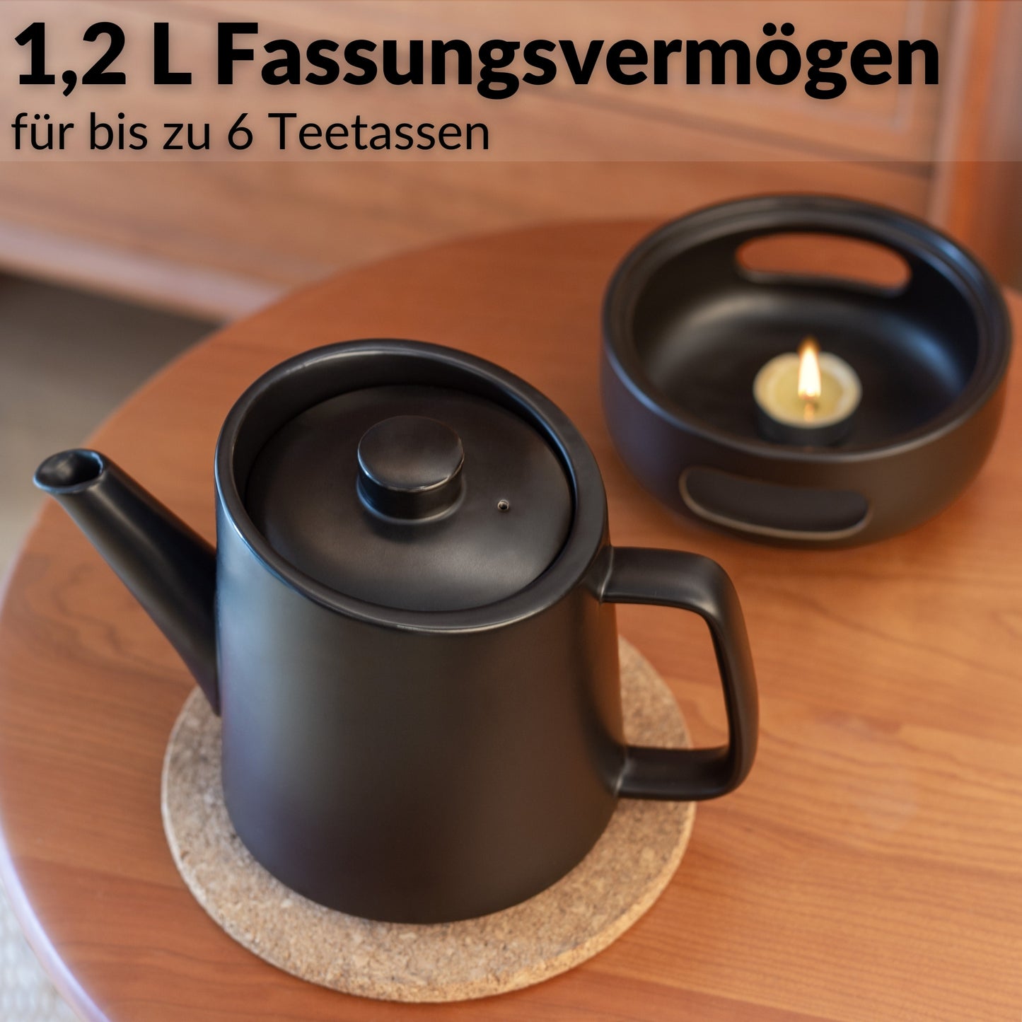 Teekanne mit Stövchen