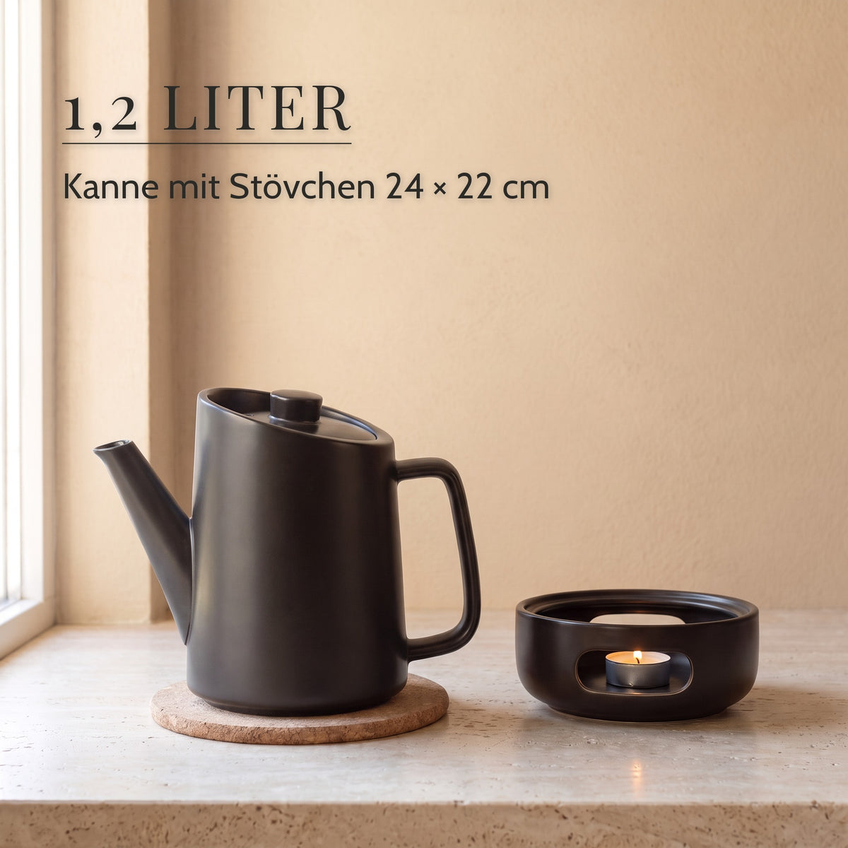 Teekanne mit Stövchen