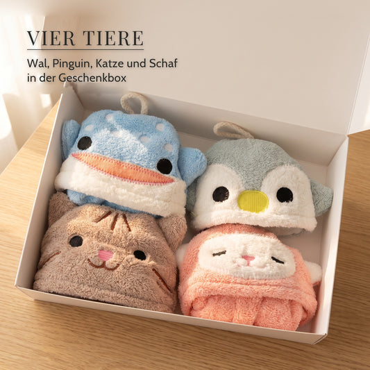 Vier Kinderwaschlappen Wal, Pinguin, Katze und Schaf in der weißen Geschenkbox