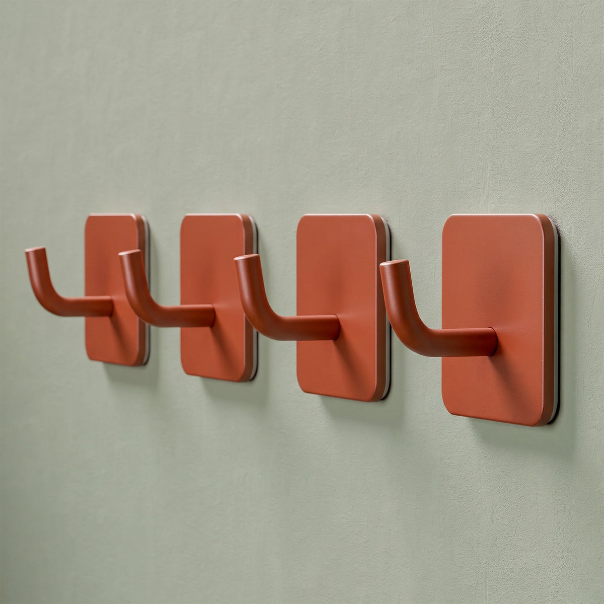 Klebehaken eckig in Terracotta, an der Wand
