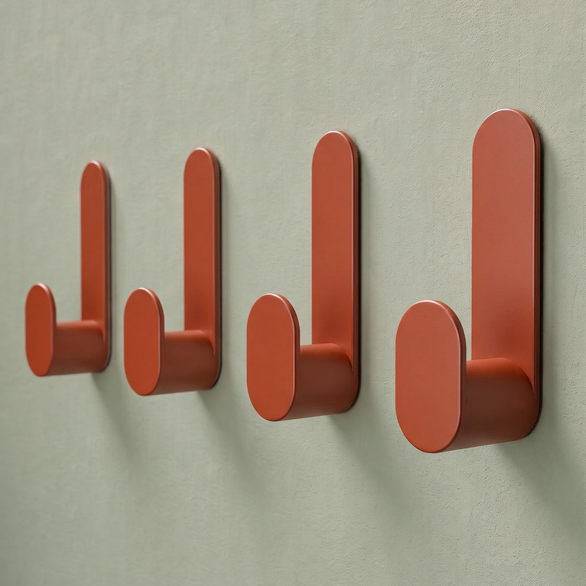 Klebehaken J-Hook in Terracotta, an der Wand